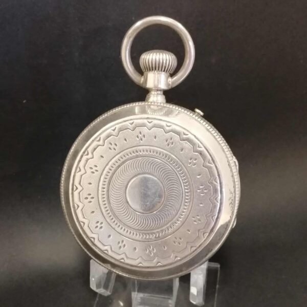 Antiguo reloj de bolsillo en plata maciza del relojero Paul Jeannot. Suiza Remontoir